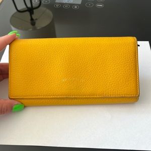 Gucci yellow leather wallet